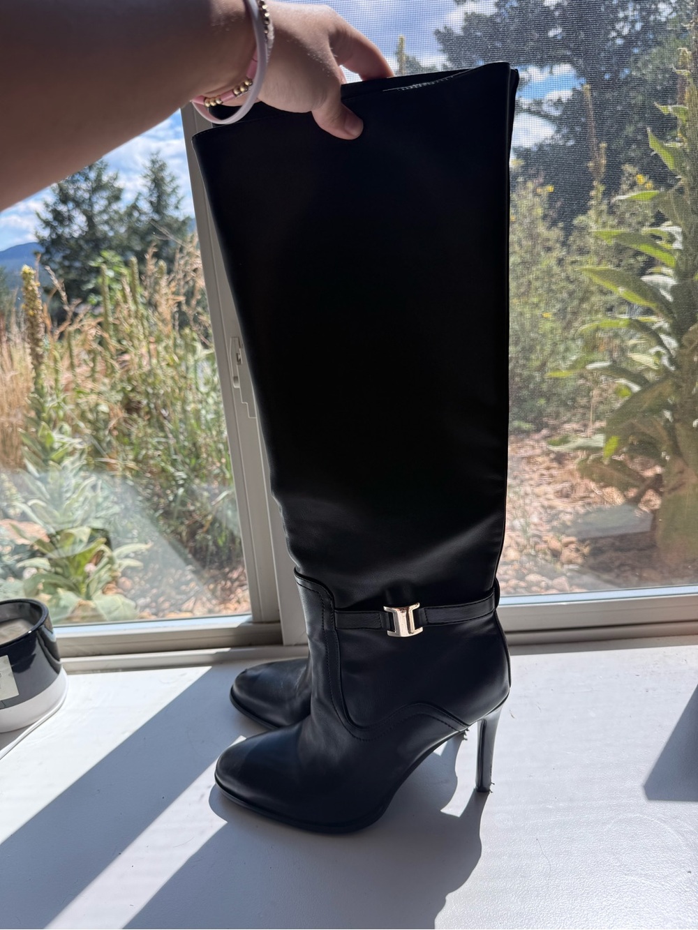 Black Knee-High Stiletto Leather Boots with Subtle Buckle Accent